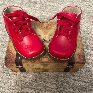 Red walking shoes with box. Never worn.